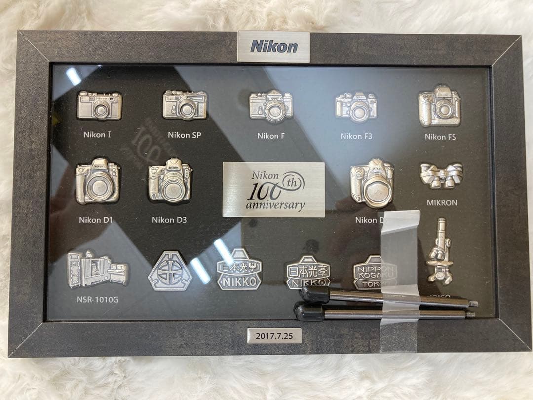 非売品】Nikon 100th anniversary 歴代カメラピンバッジ - メルカリ