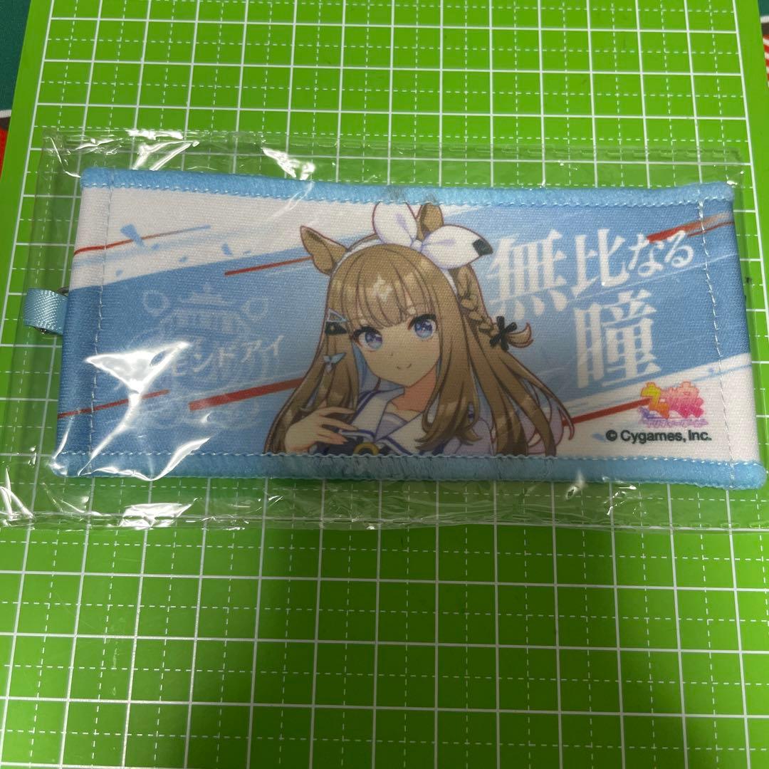 ウマ娘 リアルガチャ 公式タオルキーホルダー アーモンドアイ - メルカリ