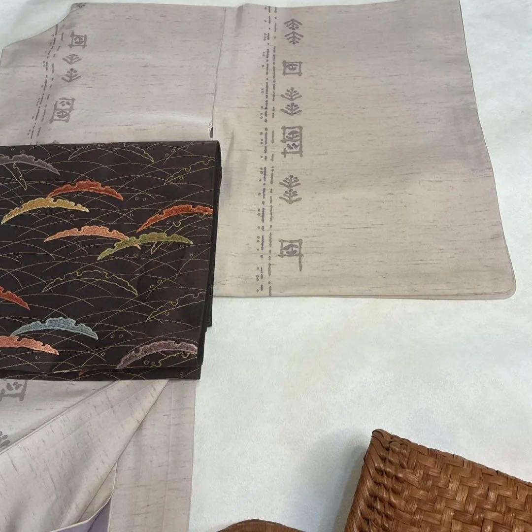 着物単品 袷 白山工房 牛首紬 染色家 市川純一郎 薄小豆色 草花 作家