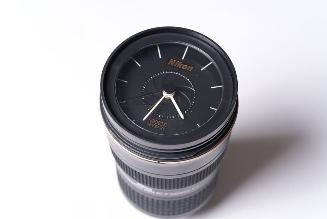 80周年記念オリジナル NIKKOR レンズクロック - メルカリ