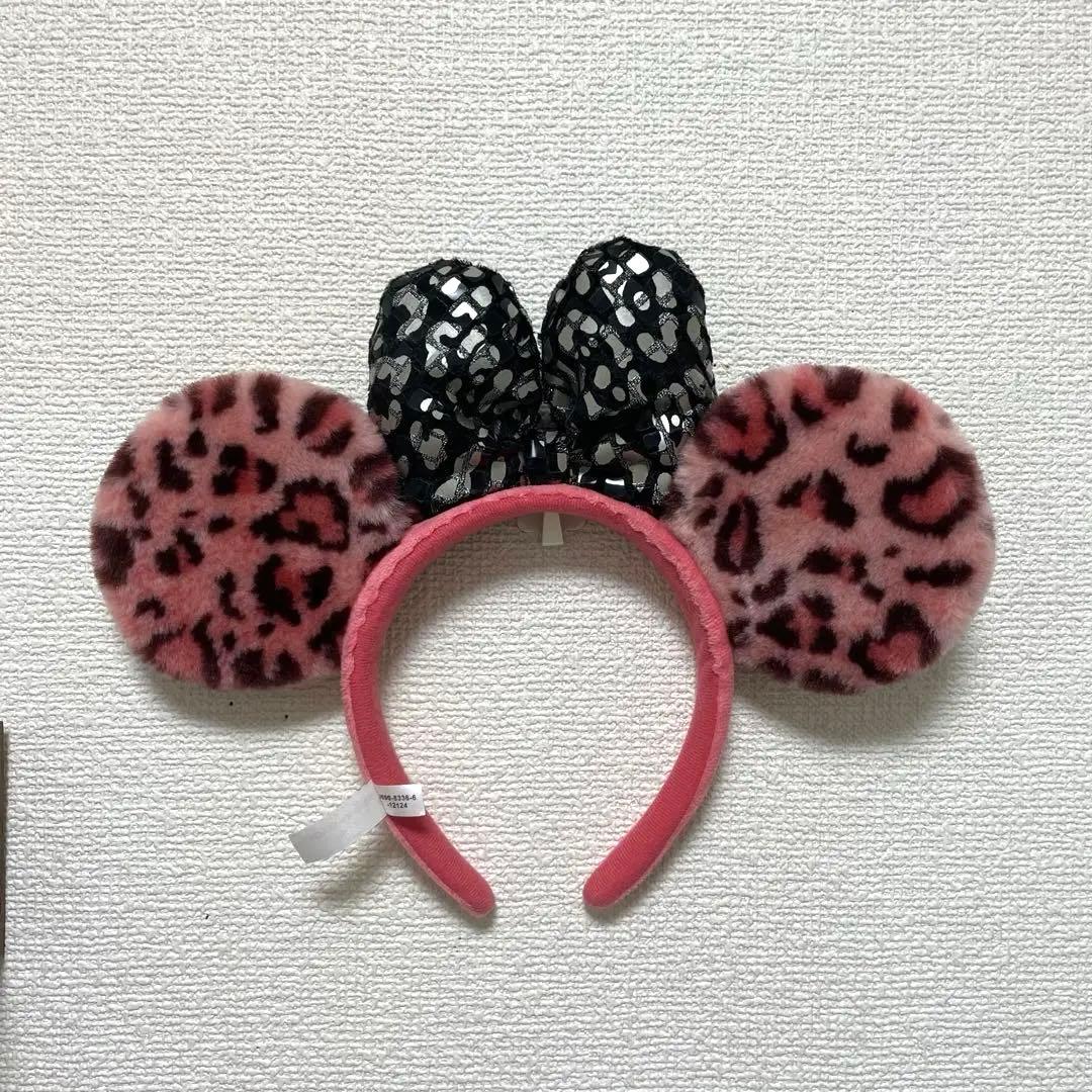 レア ディズニー カチューシャ ヒョウ柄 ピンク 黒リボン - メルカリ