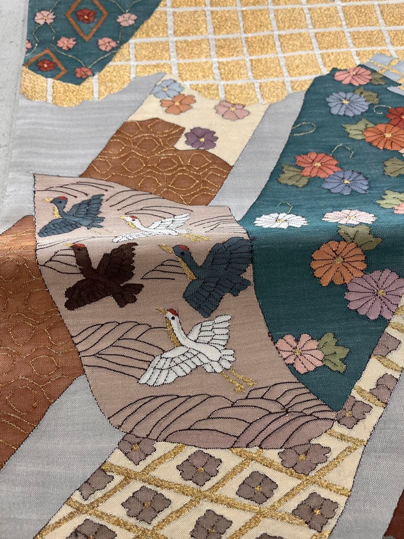 仕立て上がり新品袋帯 薄いグレーに鶴松花宝尽くしなどおめでたい柄