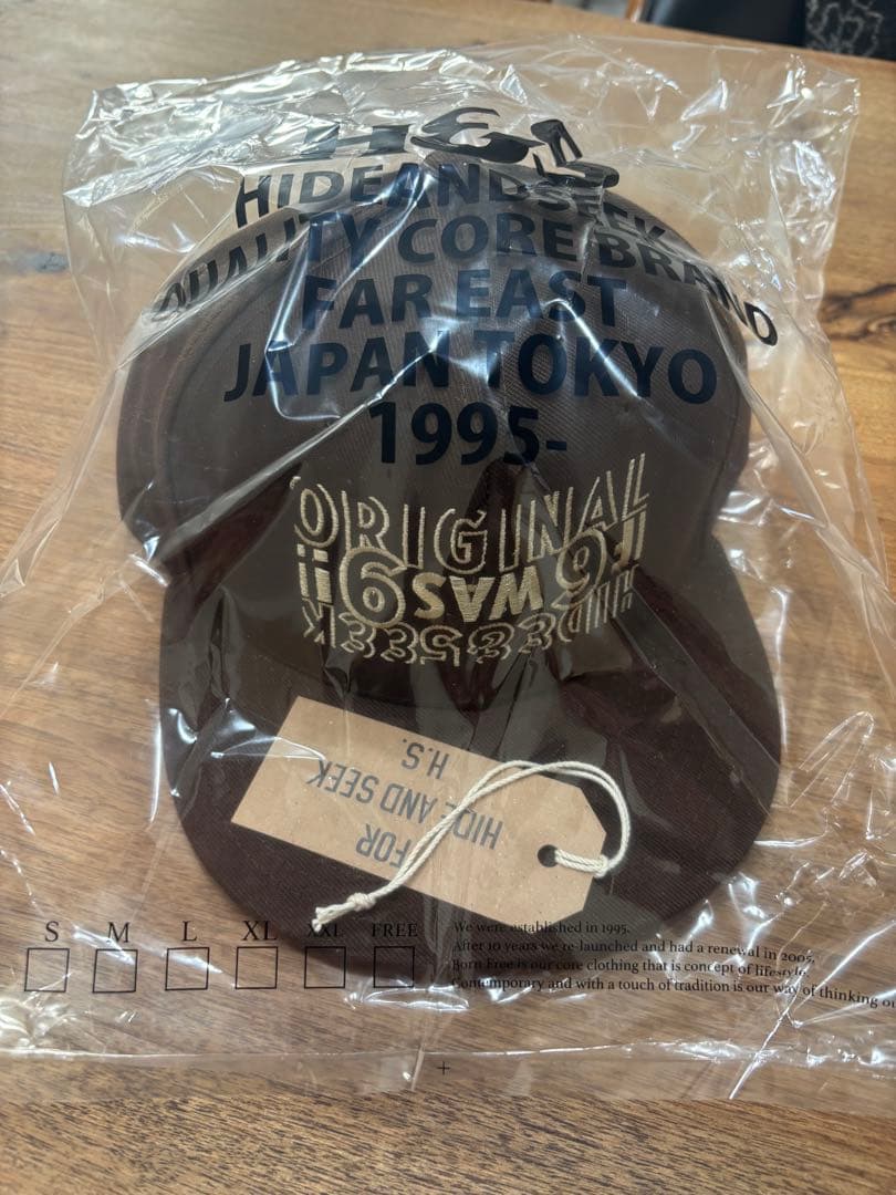 ブラウン HIDEANDSEEK × Toru Nishiura CAP - メルカリ
