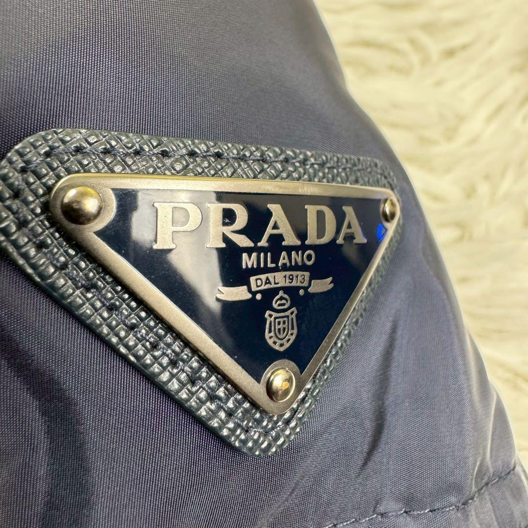 希少サイズ54✨ PRADA プラダ ダウン 三角プレート トライアングル