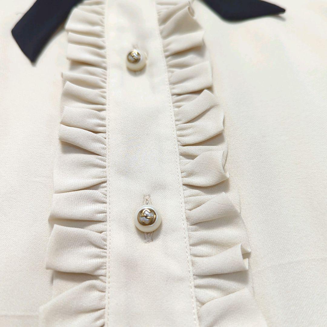 新品同様☆GUCCI☆GGパールボタン☆ボウタイ☆フリルブラウス☆ - メルカリ