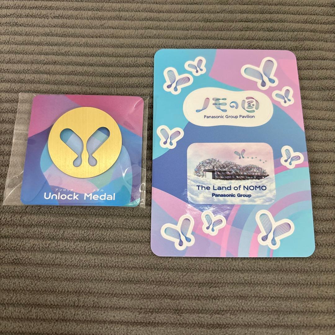 ノモの国 パナソニック パビリオン ピンバッジ 大阪関西万博 - メルカリ