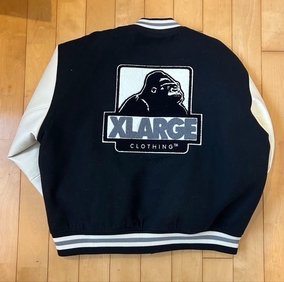 XLARGE スタジャン 黒/白ロゴ刺繍 - メルカリ