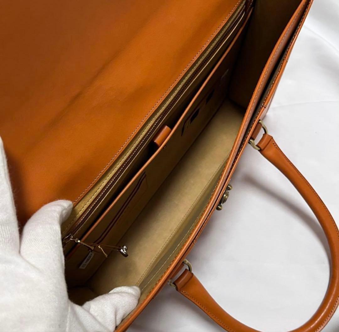 【12/31迄】《最終価格》タケオキクチ　ブリーフケース　ラップフラップダレス