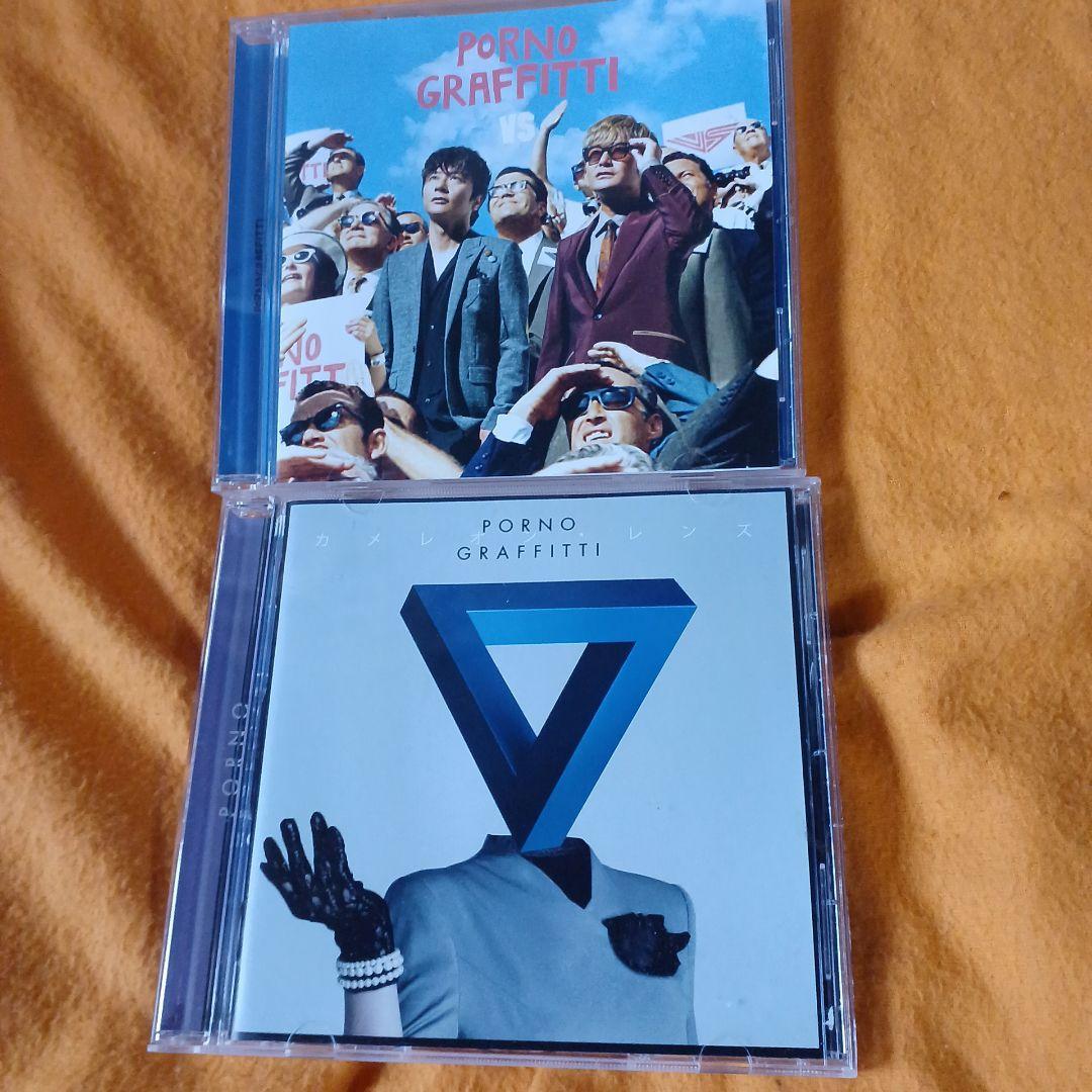 ポルノグラフィティ CDセット「VS」「カメレオン・レンズ」 - メルカリ