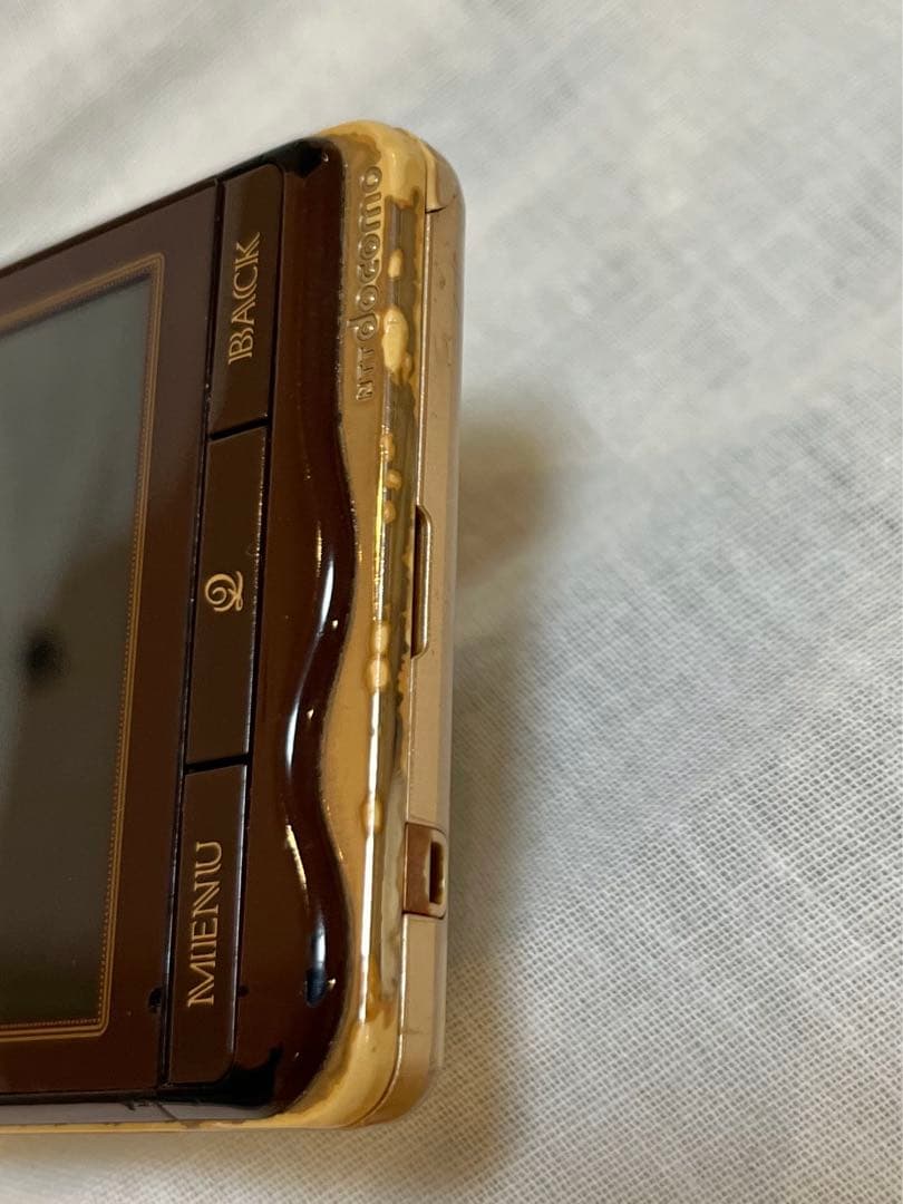 台数限定】ドコモ Q-pot Phon SH-04D チョコレートスマホ - メルカリ