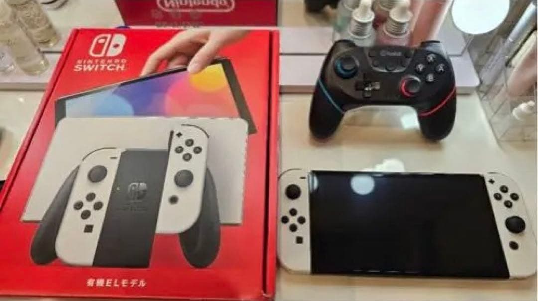 Nintendo Switch 有機ELモデル 本体＋おまけ おまけケース付き】Nintendo Switch 有機EL モデル 白 - メルカリ