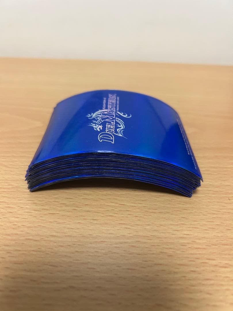 絶版)デュエルマスターズ ロゴ ブルー 青 スリーブ 旧公式 33枚 - メルカリ