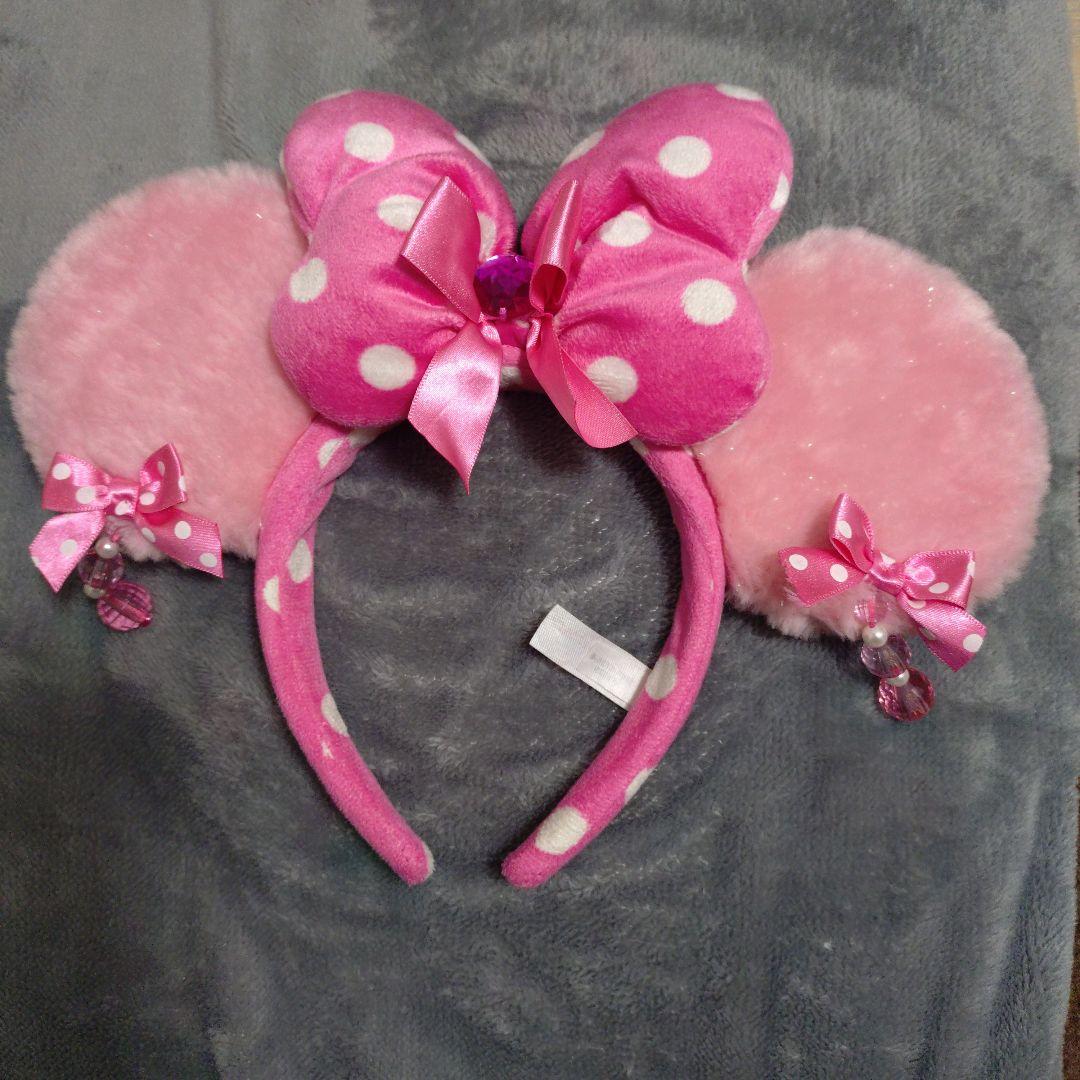 ディズニー ミニーイヤリング付きリボン カチューシャ - メルカリ