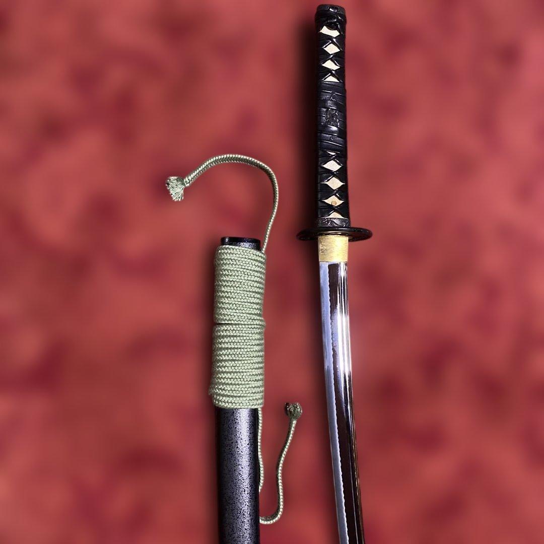 豪華居合刀 黒革巻柄 鶴松図楕円鍔 黒梨地鞘 - メルカリ