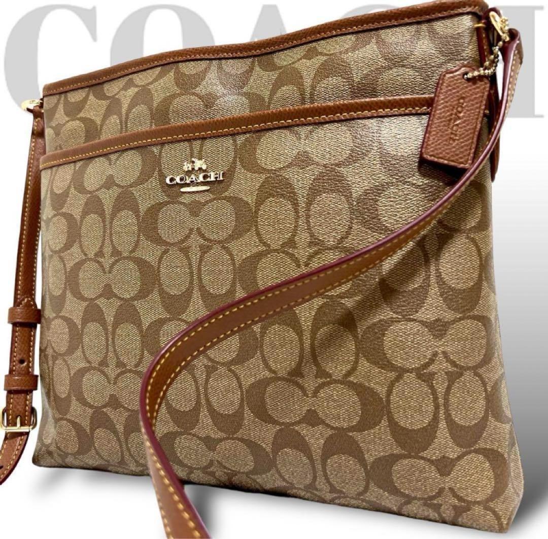 極美品 コーチ ショルダーバッグ シグネチャー PVC 斜め掛け ロゴ金具