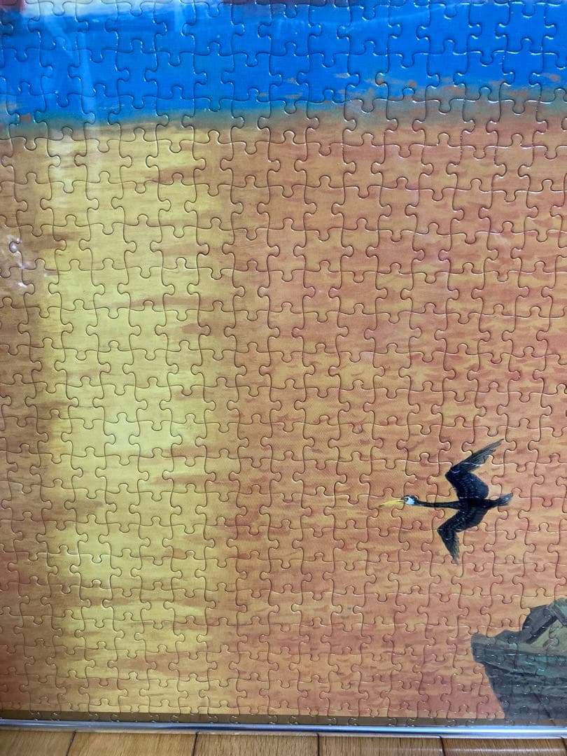 千P⑫夕日にボートと鳥 ジグソーパズル 金属額 長良川の鵜飼？夕暮れに飛ぶ