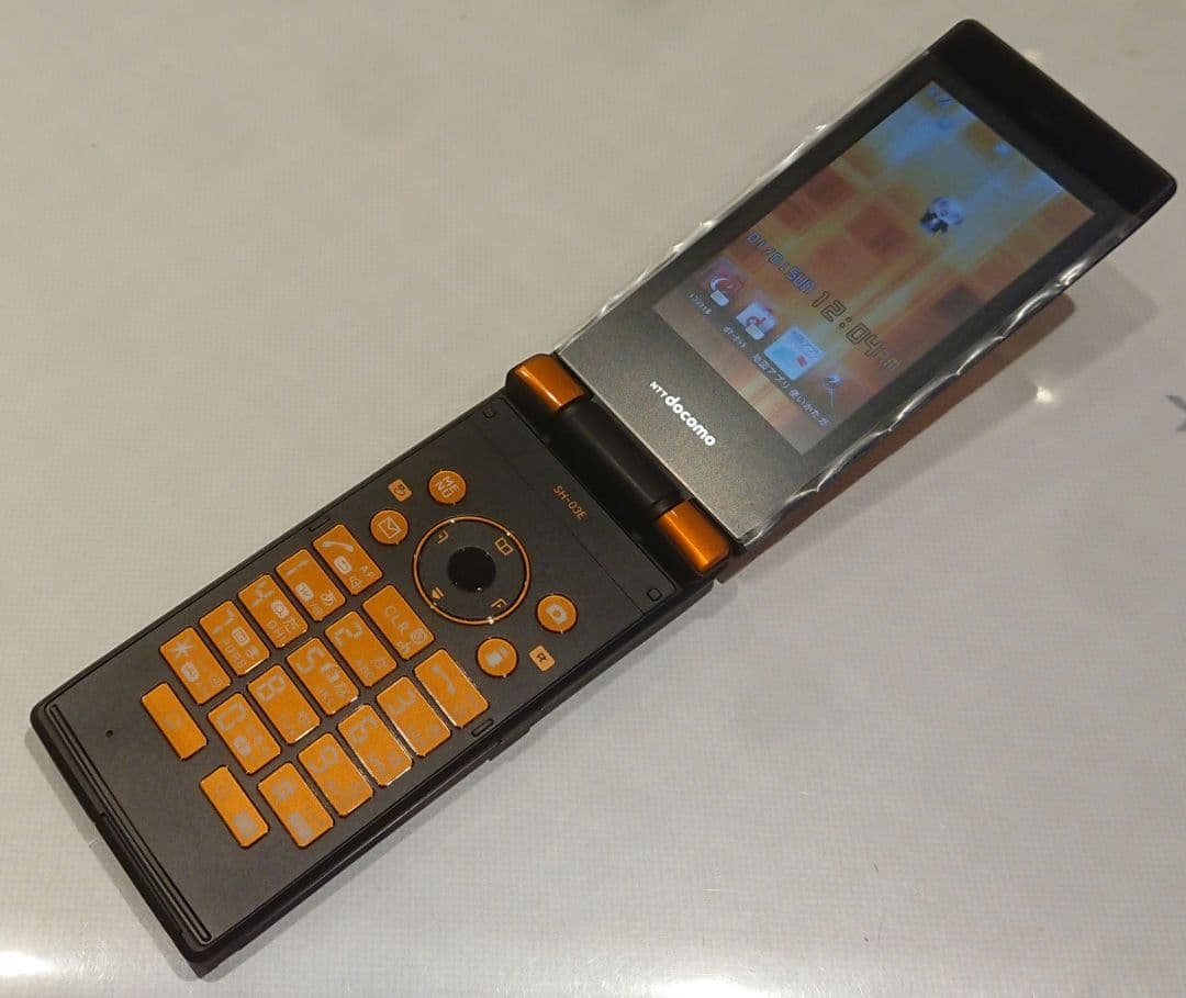 新品 レア ドコモ SH-03E オレンジ ガラケー ワンセグ ゲーム 携帯