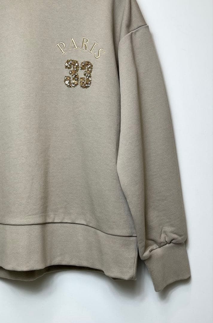PARIS 33刺繍ベージュスウェット - メルカリ