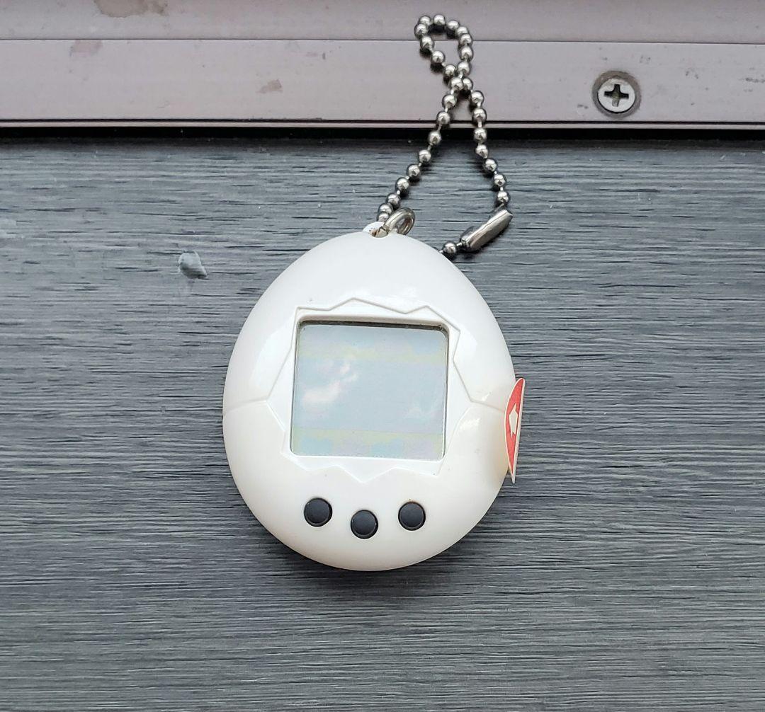BANDAI Tamagotchi ホワイト初期 Amazon.co.jp: 初代 たまごっち（ホワイト） BANDAI1996 : おもちゃ