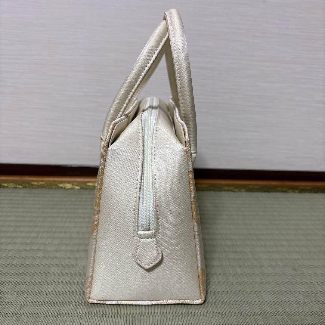 期間限定お値下げ中です！西陣織 正絹 花柄 ハンドバッグ - メルカリ