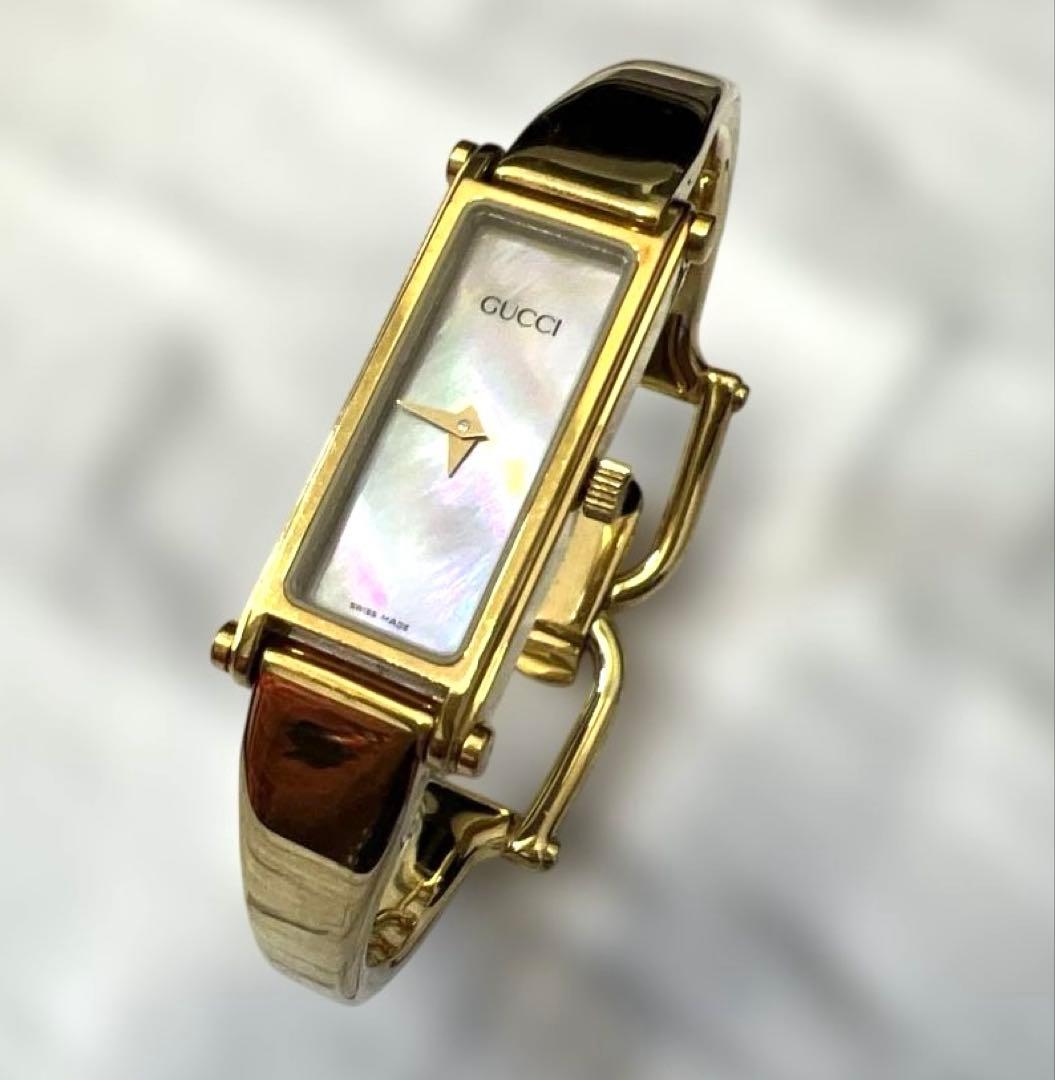 GUCCI 腕時計 1500L バングル シェル文字盤 レディース GUCCI グッチ 腕時計 1500L バングル型 クォーツ ピンクシェル文字盤