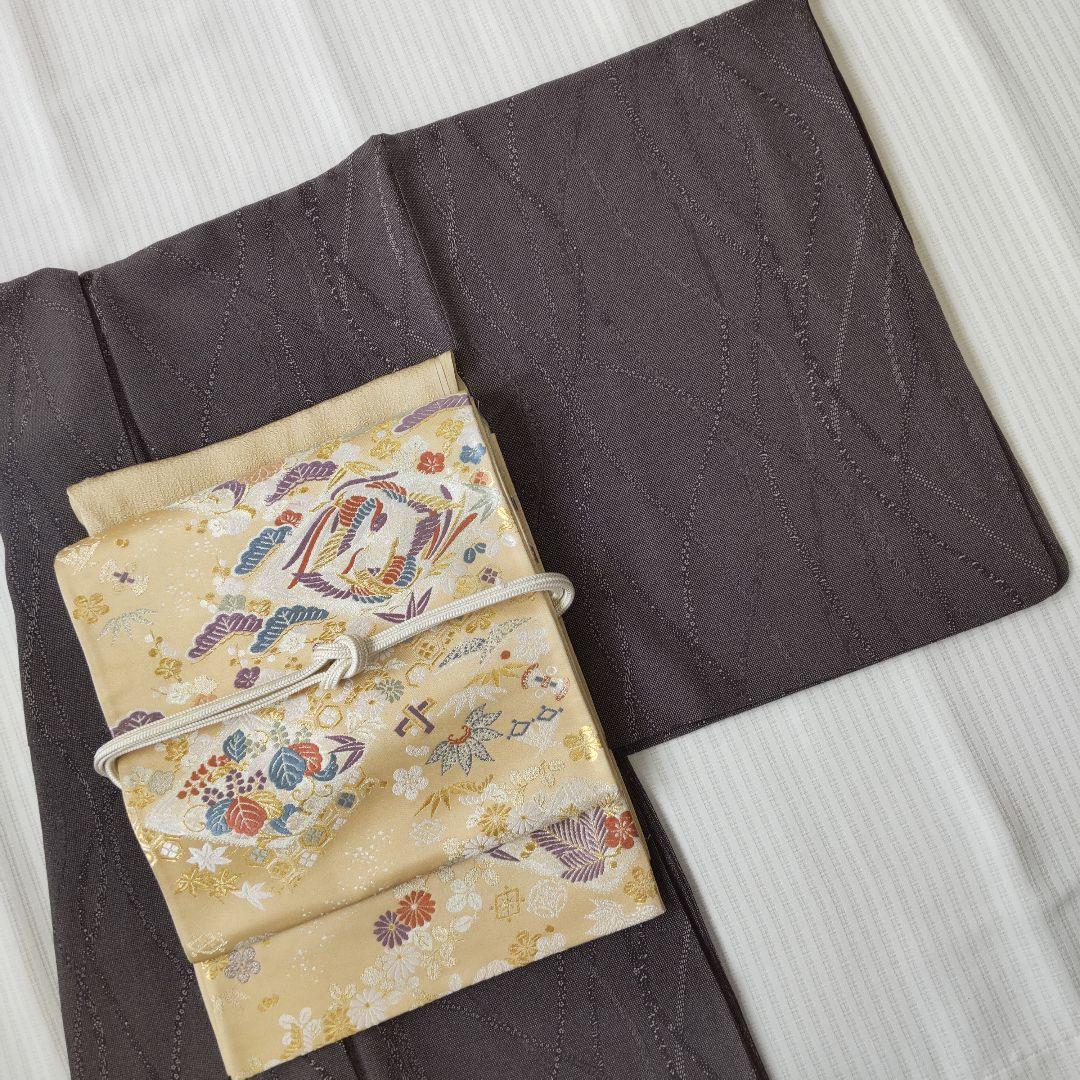 袋帯】幸せを結ぶ帯＊鳳凰と宝尽くしが織りなす西陣の華やぎ 生成り色