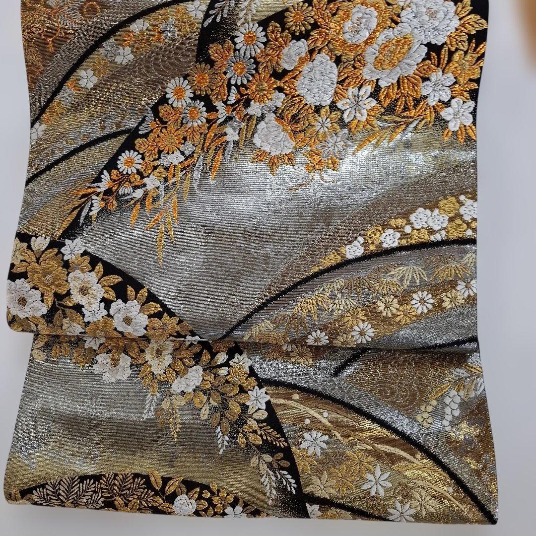 金時館 西陣袋帯 308 金色と黒の波模様 - メルカリ