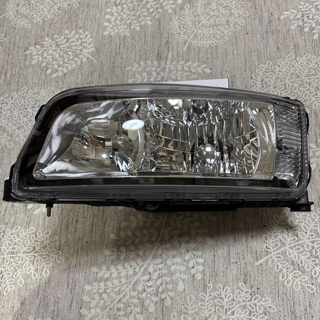 三菱ふそう　ファイター　ヘッドライト　左　ディスチャージ　たもつ 三菱ふそう ふそう ベストワン ファイター 左 ヘッドライト ハロゲン