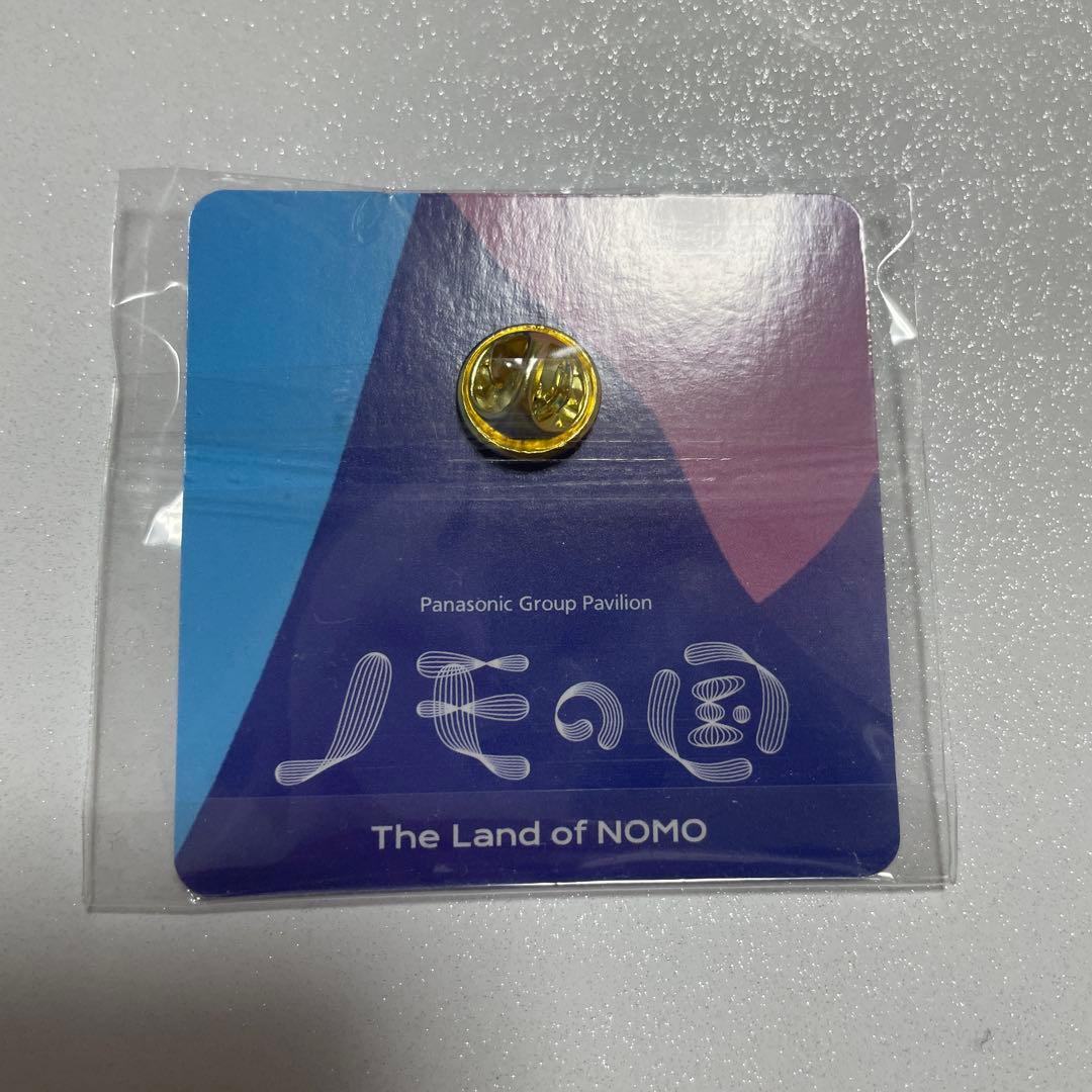 万博 ノモの国 ピンバッジ ピンズ - メルカリ