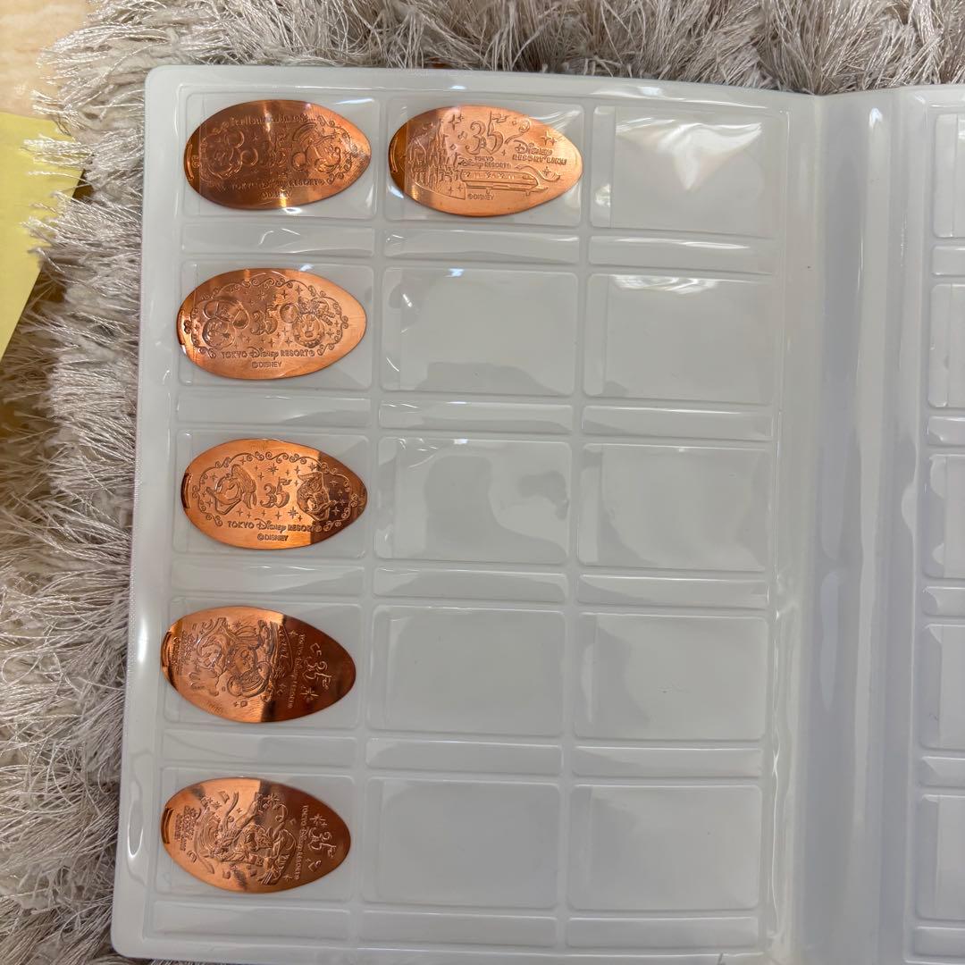 ディズニーリゾート メダルブック 35周年記念メダル+2018年メダル 計42