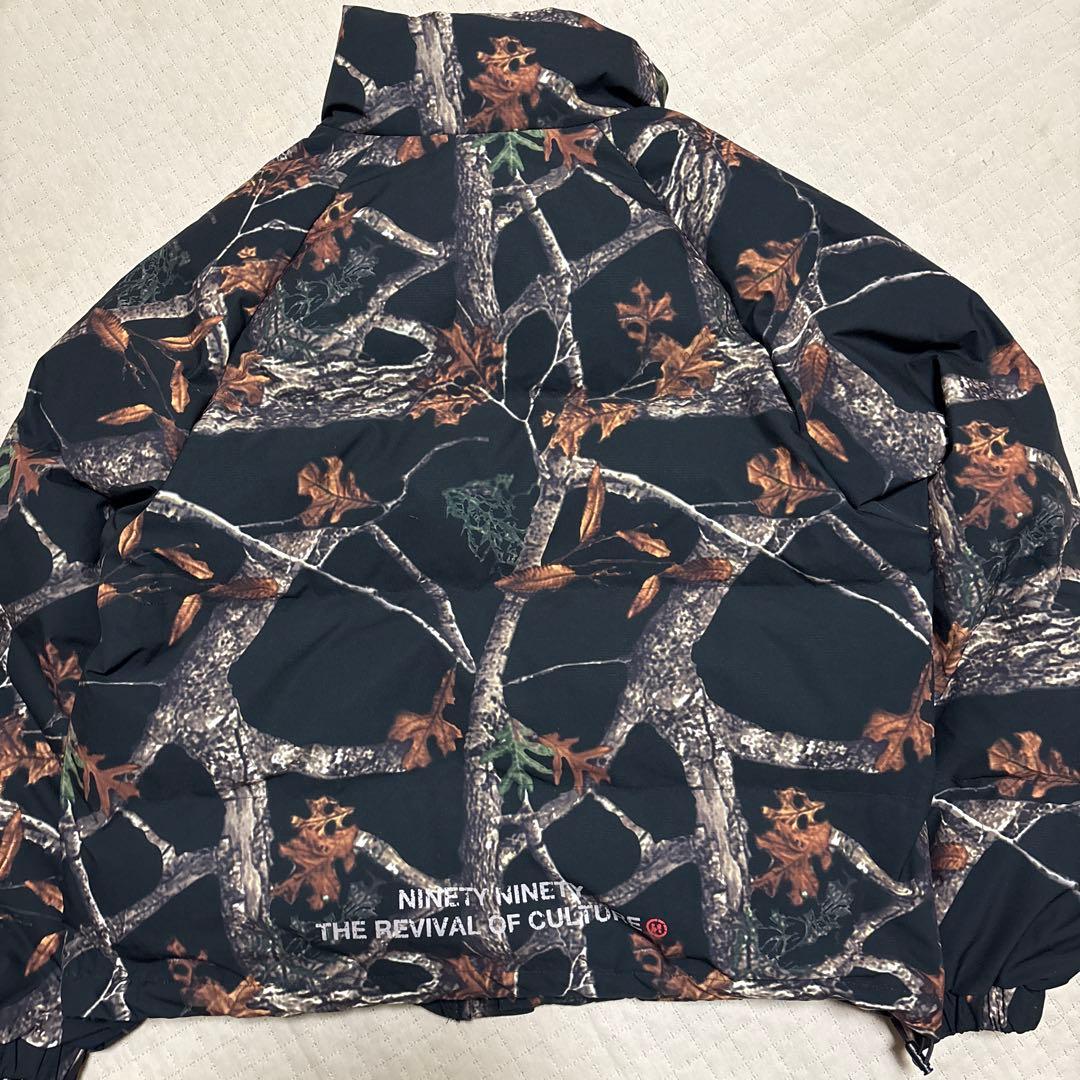 9090ブラックリアルツリーカモフラージュ柄ダウンジャケット - メルカリ