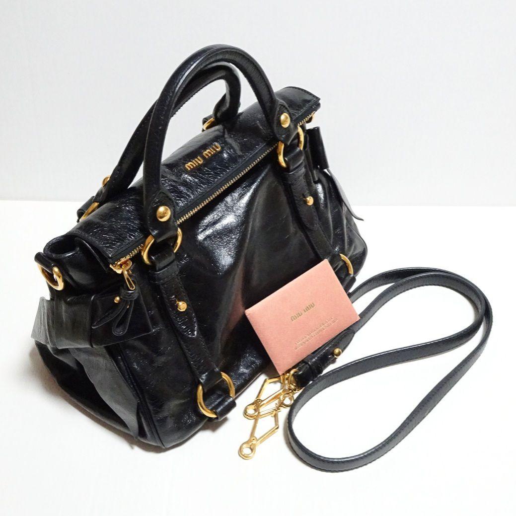 miumiu サイドリボン 2wayバッグ ブラック ヴィッテロルクス - メルカリ