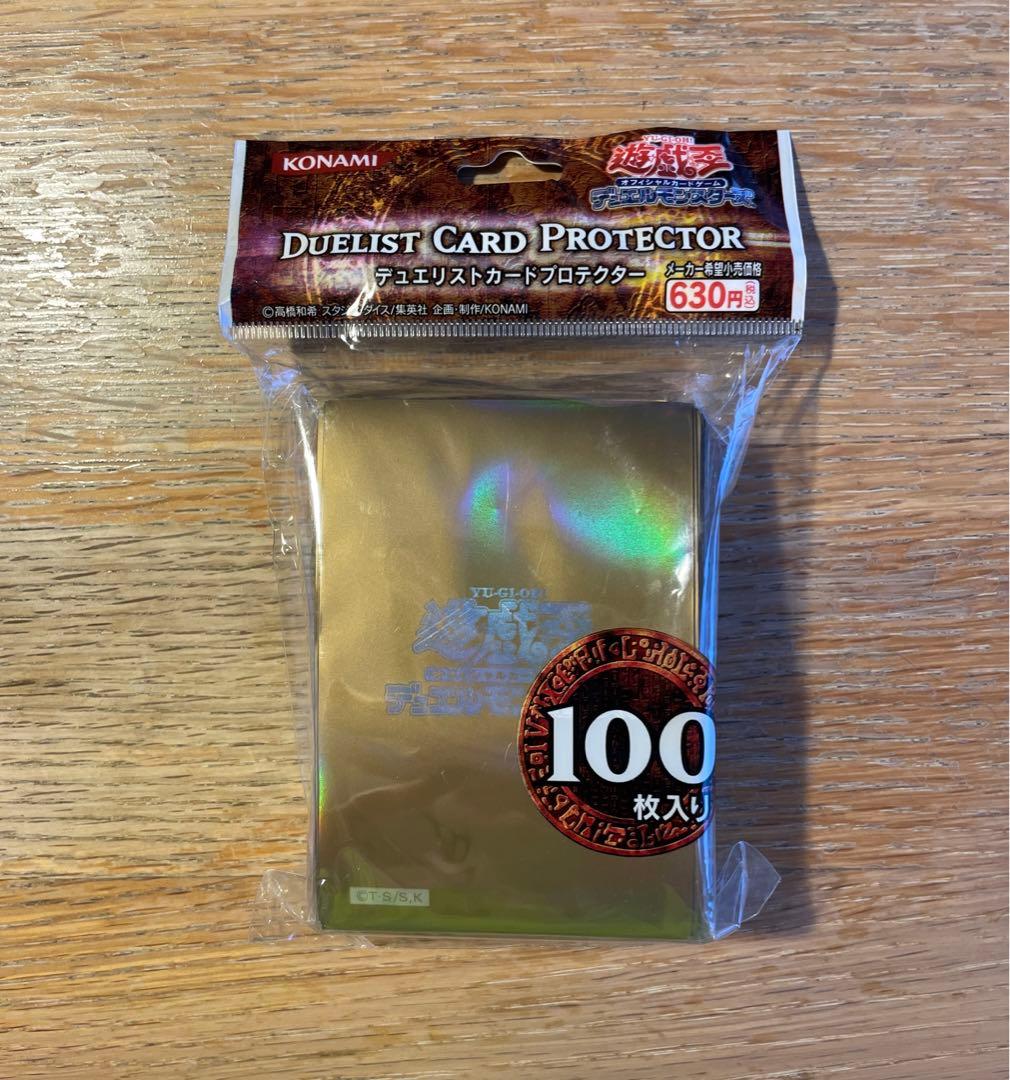 遊戯王 初期ロゴ 金 未開封 スリーブ - メルカリ