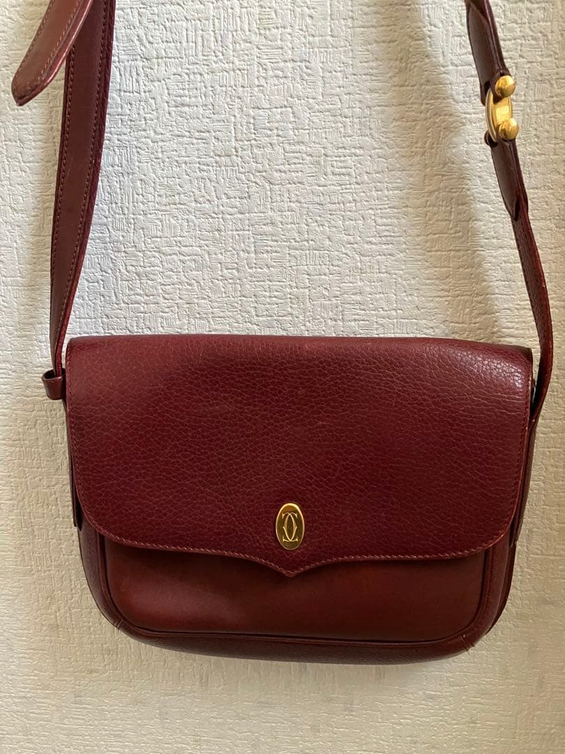 Cartier カルティエ　ショルダーバッグ　ポシェット　レザー　ボルドー Cartier - カルティエ レザーショルダーバッグ ポシェット ボルドーの