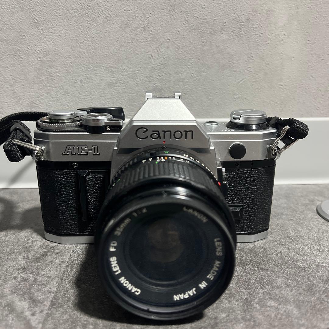Canon AE-1 一眼レフカメラ 50mmレンズ付き 動作品？ Amazon | Canon AE-1 35mmフィルムカメラ 50mm 1:1.8レンズ付き
