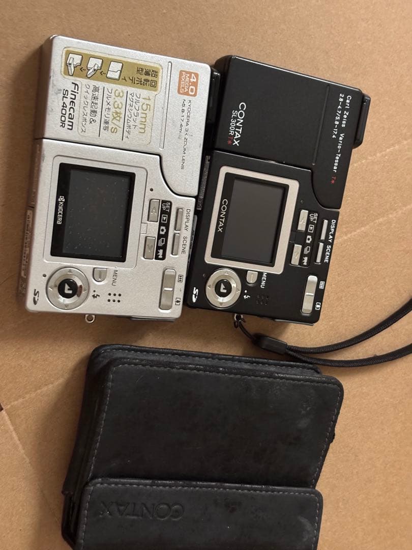京セラ デジタルカメラ SL300R とSL400R中古品 動作未確認 京セラ、レンズ回転式の400万画素機「Finecam SL400R」