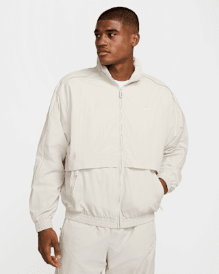 Nike Sportswear Solo Swoosh Men's Woven Track Jacket. Nike.com