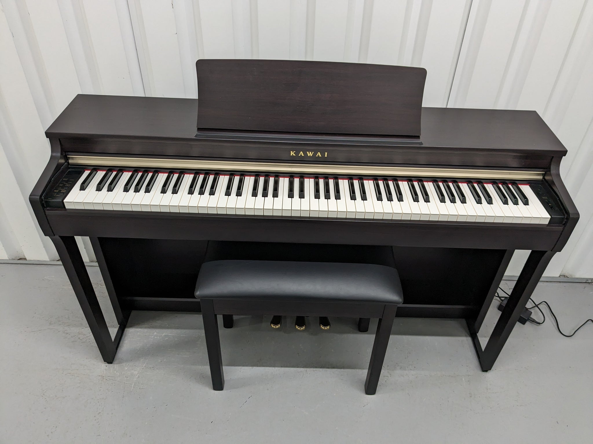 Kawai CN27 digital piano and stool in rosewood finish stock number